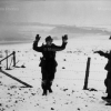 Американский солдат берет в плен немецкого военнослужащего, 23 декабря 1944 - Роберт Капа (Robert Capa)